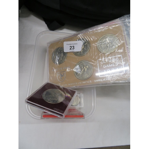 23 - A good collection of cased Manx Crowns, £2 coins etc