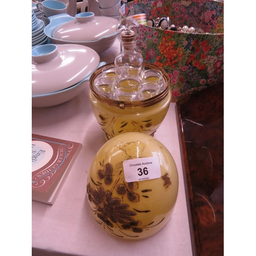 36 - Yellow glass Egg shaped decanter and glasses holder