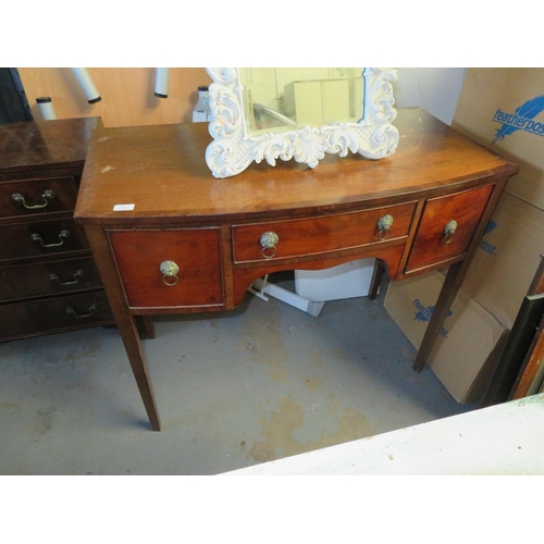 119 - Bow fronted chest with three drawers and ring pull lion's head furniture