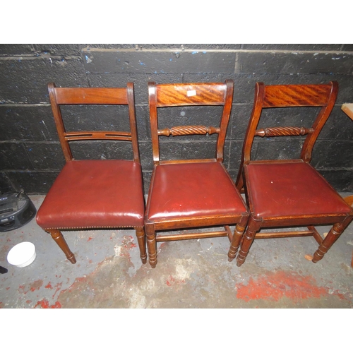 120 - Three leather seated chairs