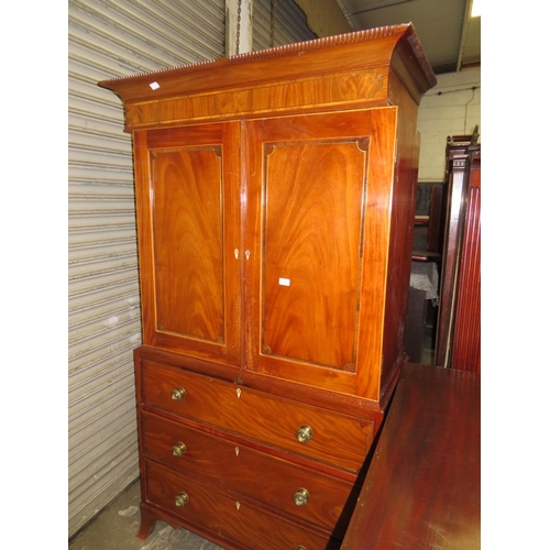 39 - Mahogany wardrobe with three long drawers to base with brass circular handles