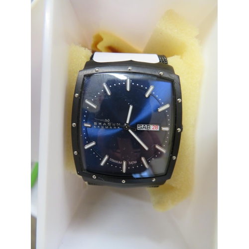 164 - Gent's Skagen day date wrist watch with black strap on blue dial