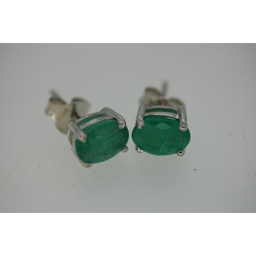 247 - Pair of Emerald Ear Studs set in silver