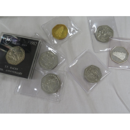 517 - IOM TT 50 p's 1981, 1982, 1983, 1984, 1997 plus 2 medallions