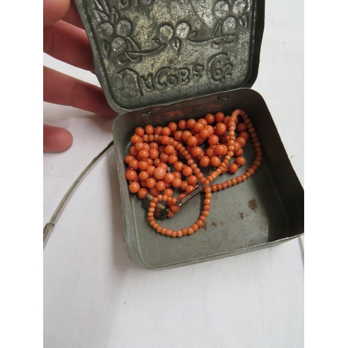 125 - Jacob and Co Biscuits Box Containing Coral Bead Necklaces