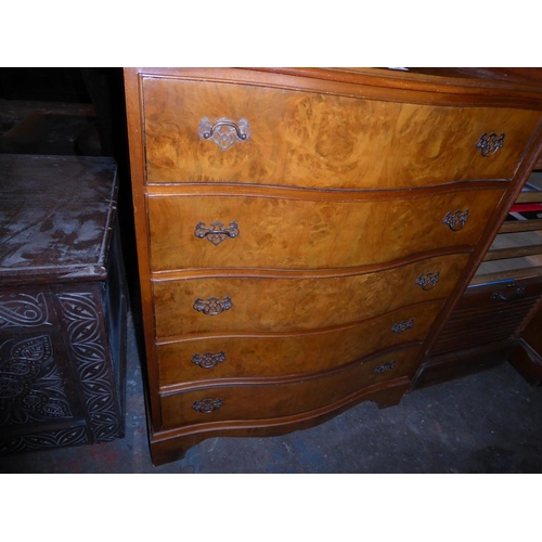 144 - Five drawer walnut veneered serpentine fronted chest