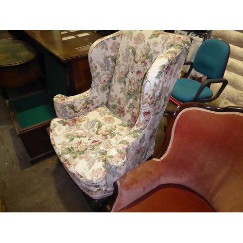 203 - Floral upholstered wing chair plus a parlour armchair