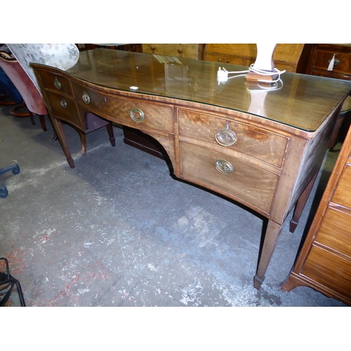 204 - Serpentine fronted sideboard of three drawers with brass swing handles plus a table lamp