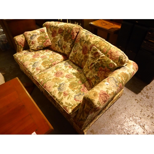 235 - Three seater settee in floral upholstery