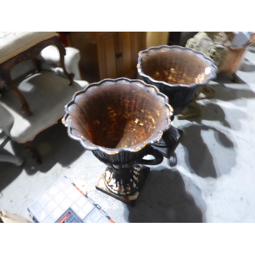 25 - Pair of quality cast iron urns, height 25ins (damaged)