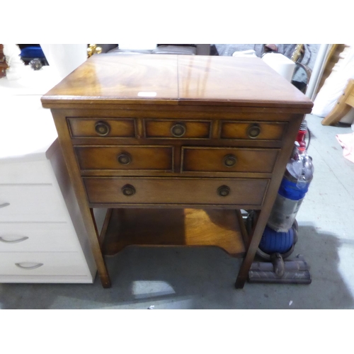 38 - Mahogany six drawer cabinet with fold out top