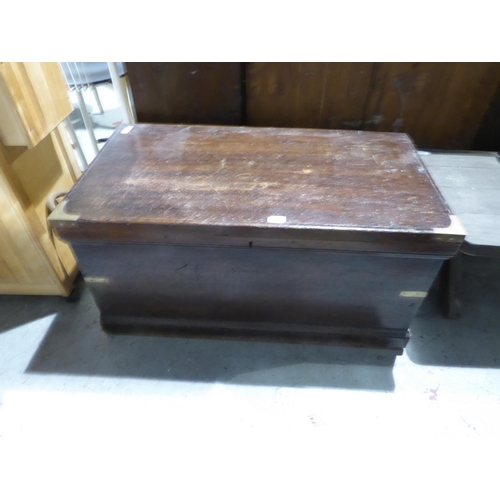 52 - Quality mahogany storage trunk with brass corners and rope handles to sides