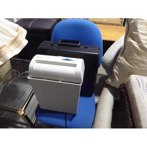 57 - Office chair, a typewriter and a shredder