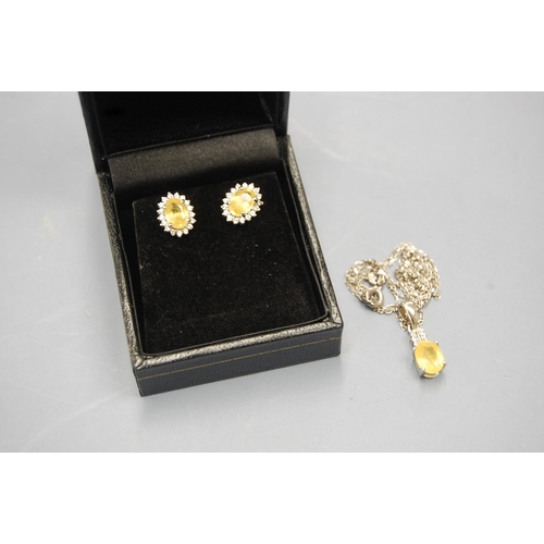 439 - Yellow Sapphire ear studs and pendant necklace