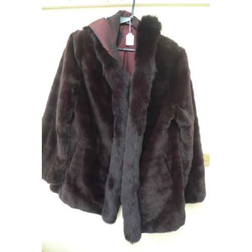 573 - Ladies reversible burgundy fur coat with hood and fur trim - size 14