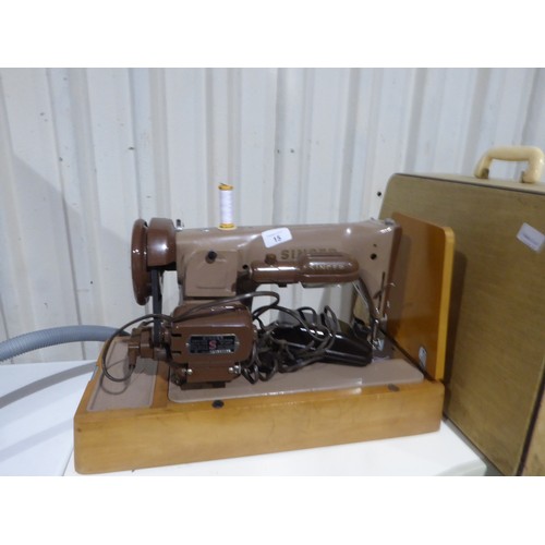 15 - Singer electric sewing machine