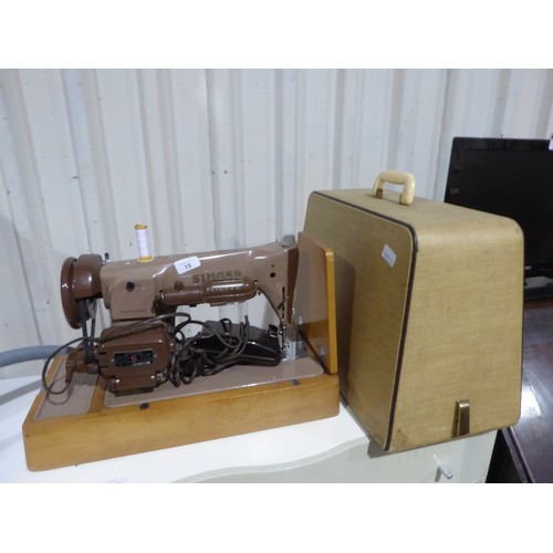 15 - Singer electric sewing machine