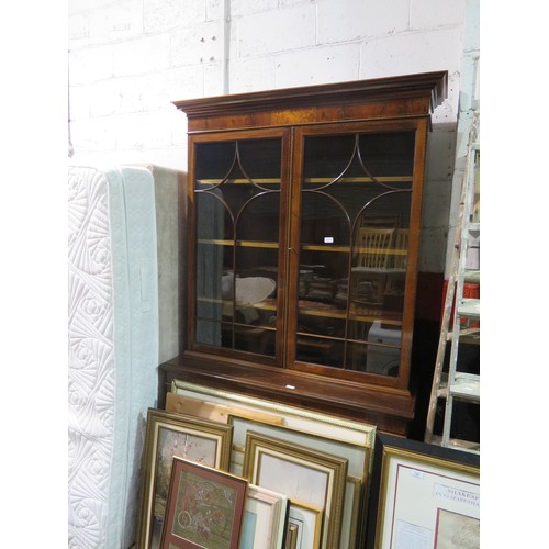 121 - Mahogany bookcase with astragal glazed doors to top and cupboard to base