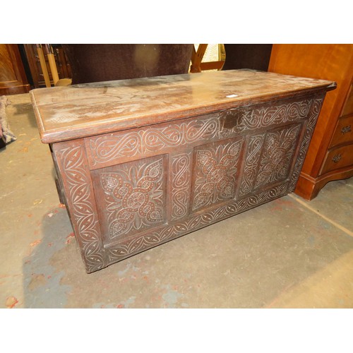 143 - Well carved oak blanket box