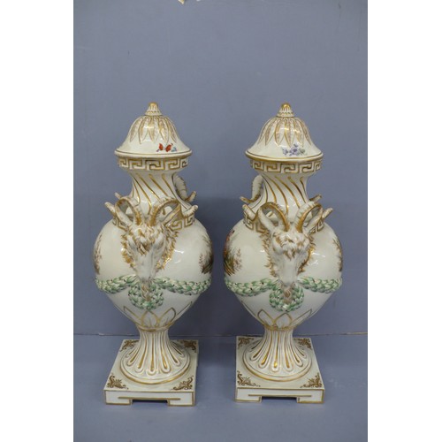 50 - Pair of Meissen Style Porcelain Urns with Covers having rams mask handles, garland decoration in rel... 