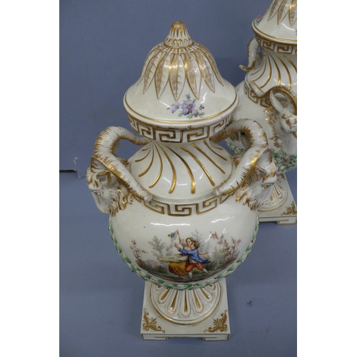 50 - Pair of Meissen Style Porcelain Urns with Covers having rams mask handles, garland decoration in rel... 