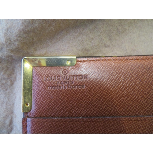 1 - Louis Vuitton leather wallet in monogrammed cover