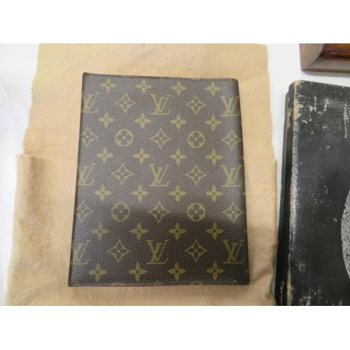 6 - Louis Vuitton leather wallet in monogrammed cover