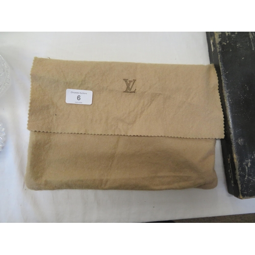 6 - Louis Vuitton leather wallet in monogrammed cover