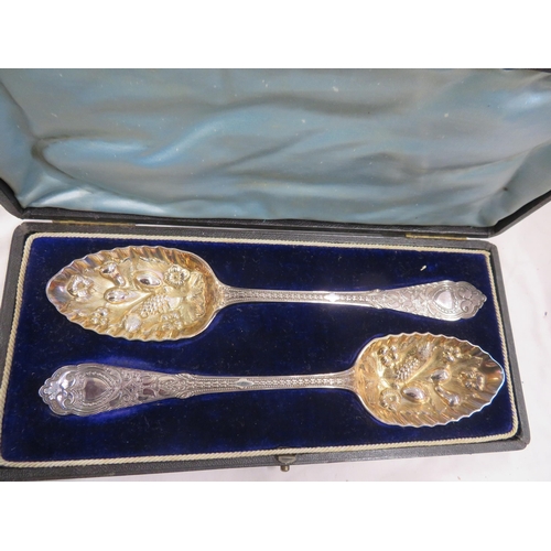 61 - Two cased sets of large spoons