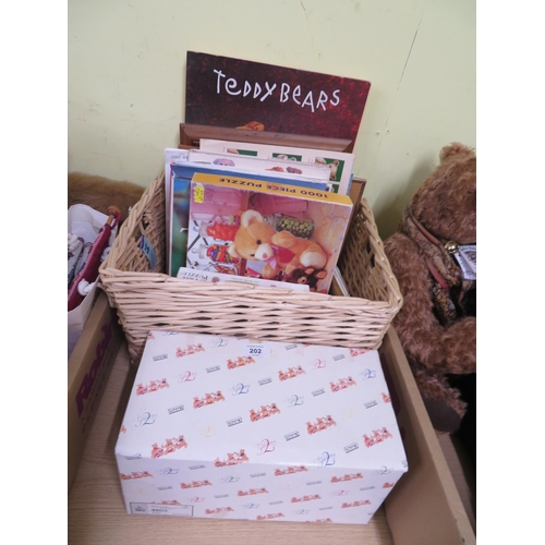 151 - Basket of books on making teddy bears, posters and jigsaws plus a teddy teapot