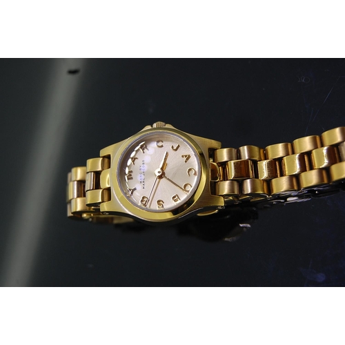 106 - Ladies gold plated wristwatch, with extra links