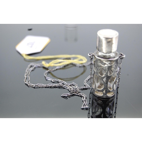 107 - Silver pendant scent bottle on a chain