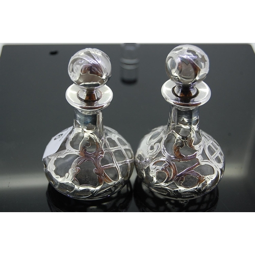 116 - pair of silver overlay scent bottles