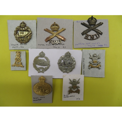 61 - Collection of WWI Tank and Carbiners cap badges