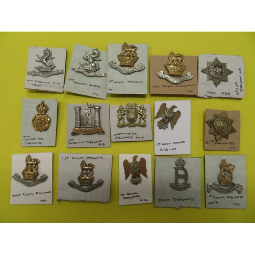 83 - Sixteen Dragoon's regiments cap badges