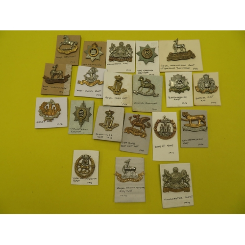 84 - Twenty Royal and County Regiment cap badges, mostly WWI