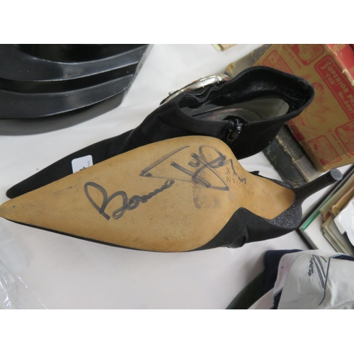 121 - A Pair of autographed shoes, signed by Bonnie Tyler