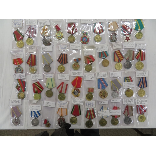 138 - Forty Russian military medals with descriptions