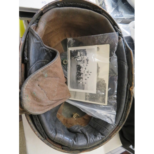 42 - 1930s 'Pudding' Motorcycle helmet, together with photographs showing it being used in the Pyramid Mo... 