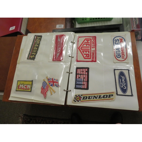 207 - An album of stickers and cloth patches relating to car racing