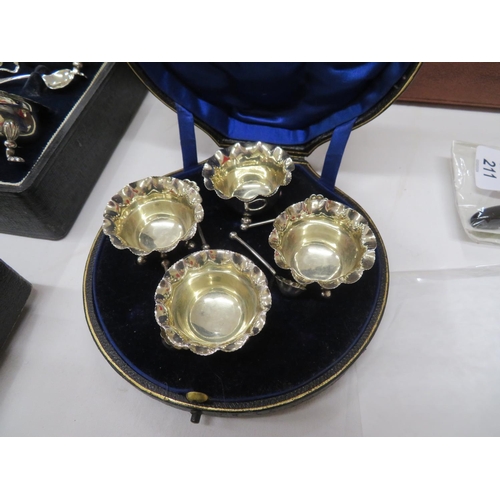 213 - Four silver salts with matching spoons, cased, 3.38ozt total