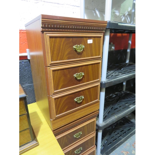 11 - Pair of three drawer bedside cabinets with brass swing handles