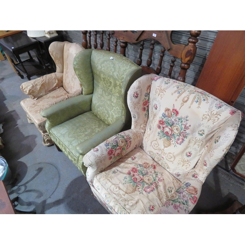 131 - Three wing back chairs