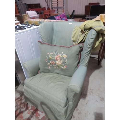 139 - Green upholstered wing chair