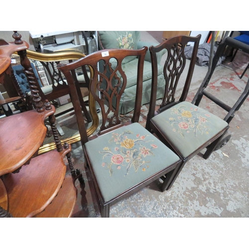 15 - Pair of Georgian mahogany Chippendale style dining chairs with green floral upholstery to seats