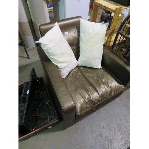 47 - Shiny brown leather easy chair