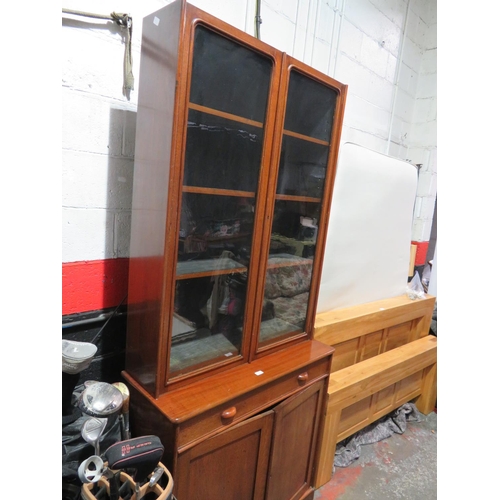 77 - Bookcase with cupboard and single drawer to base