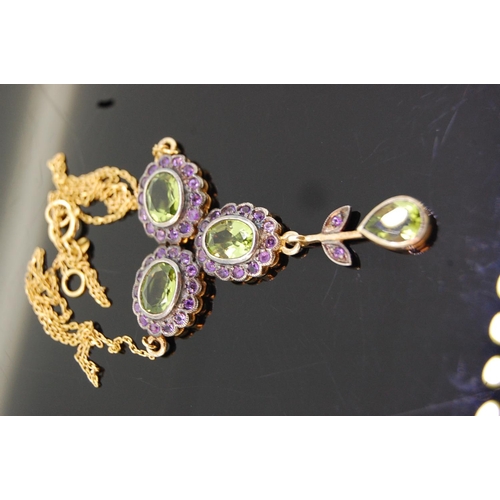 197 - Ornate Edwardian style 9 ct. gold and silver peridot and amethyst necklace