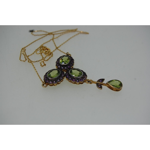 197 - Ornate Edwardian style 9 ct. gold and silver peridot and amethyst necklace