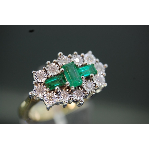 206 - Emerald and diamond fancy cluster ring set in gold - size N